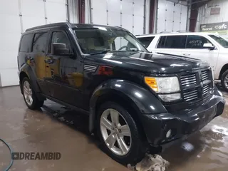 2011 Dodge Nitro Heat with VIN 1D4PU4GK1BW602572, listed as a IAAI auction lot 41529030 with 134,482 mi miles. Bid and sale history available at carsss.com. Image 1.