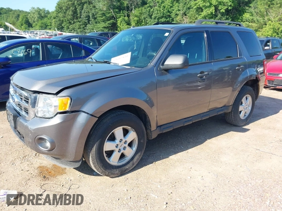 2012 Ford Escape XLT z VIN 1FMCU9DG7CKB28270, wystawiony jako IAAI lot #42607520 z przebiegiem 129 758 mil mil oraz . Historia ofert i sprzedaży dostępna na DreamBid. Obrazek 17.