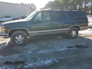 1999 Chevrolet Suburban with VIN 1GNFK16R5XJ306610, listed as a Copart auction lot 87890025 with 155,580 mi miles and Salvage Title. Bid and sale history available at carsss.com. Image 1.