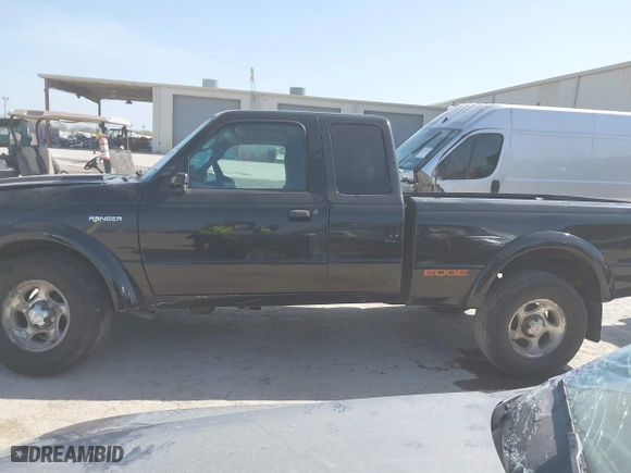 2003 Ford Ranger XL Fleet with VIN 1FTZR45E23PA81801, listed as a IAAI auction lot 41825231 with 105,092 mi miles. Bid and sale history available at carsss.com. Image 14.