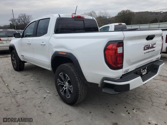 2024 GMC Canyon 4WD AT4 with VIN 1GTP6DEK7R1161063, listed as a Copart auction lot 82523764 with 6,069 mi miles and Salvage Title. Bid and sale history available at carsss.com. Image 2.