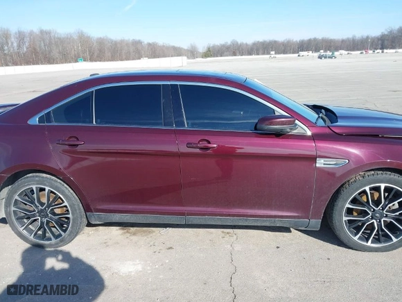 2018 Ford Taurus SEL with VIN 1FAHP2E84JG113599, listed as a IAAI auction lot 41526343 with 105,798 mi miles. Bid and sale history available at carsss.com. Image 14.