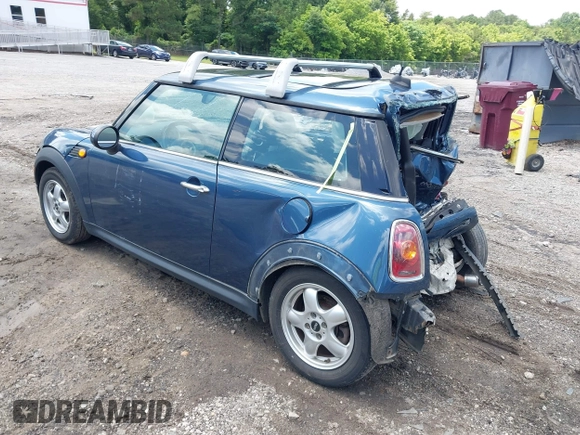 2009 MINI Hardtop with VIN WMWMF33509TU74290, listed as a IAAI auction lot 42538919 with 104,209 mi miles and . Bid and sale history available at DreamBid. Image 3.