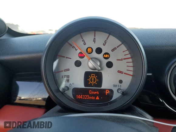 2012 MINI Cooper Coupe with VIN WMWSX1C5XCT163790, listed as a Copart auction lot 73148734 with 144,323 mi miles and Salvage Title. Bid and sale history available at carsss.com. Image 9.