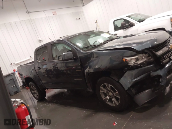 2020 Chevrolet Colorado 4WD Z71 with VIN 1GCGTDEN1L1163546, listed as a IAAI auction lot 41706719 with 64,662 mi miles and . Bid and sale history available at DreamBid. Image 13.
