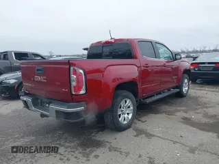 2018 GMC Canyon 2WD SLE with VIN 1GTG5CEN5J1285392, listed as a IAAI auction lot 41596516 with 73,885 mi miles. Bid and sale history available at carsss.com. Image 4.