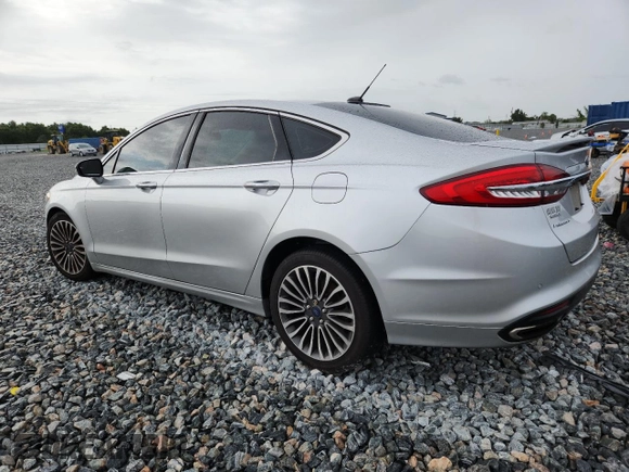 2018 Ford Fusion Titanium with VIN 3FA6P0D91JR207051, listed as a Copart auction lot 59539135 with 204,017 mi miles and Salvage title. Bid and sale history available at DreamBid. Image 2.