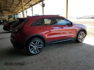 2019 Cadillac XT4 FWD Sport z VIN 1GYFZER44KF160024, wystawiony jako Copart lot #56767925 z przebiegiem 82 881 mil mil oraz Szkoda całkowita • Salvage title. Historia ofert i sprzedaży dostępna na DreamBid. Obrazek 3.