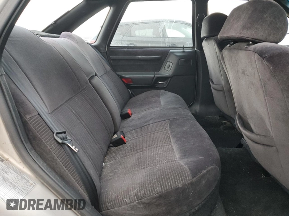 1991 Ford Taurus with VIN 1FACP52U9MG101093, listed as a Copart auction lot 45948105 with 594,696 mi miles and Salvage title. Bid and sale history available at DreamBid. Image 10.