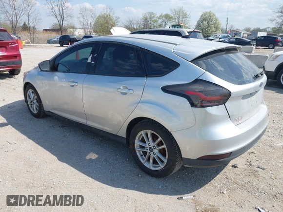 2015 Ford Focus SE with VIN 1FADP3K20FL288791, listed as a IAAI auction lot 42118958 with 164,248 mi miles. Bid and sale history available at carsss.com. Image 3.