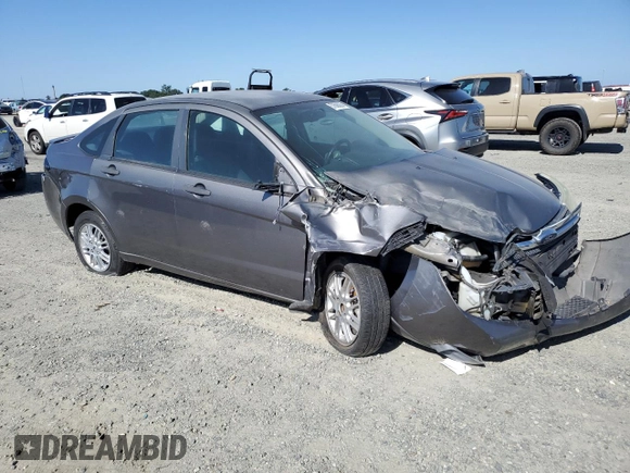 2009 Ford Focus SE z VIN 1FAHP35N59W148326, wystawiony jako Copart lot #57688025 z przebiegiem Nie podano mil oraz Szkoda całkowita • Salvage title. Historia ofert i sprzedaży dostępna na DreamBid. Obrazek 4.