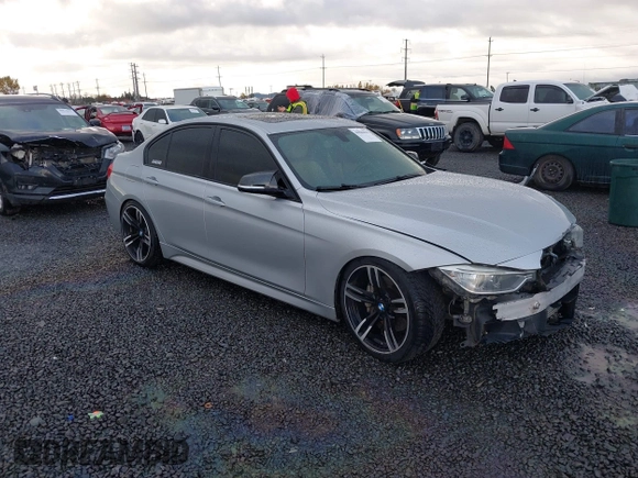 2013 BMW 3 Series 335i with VIN WBA3A9C50DF475024, listed as a IAAI auction lot 40884045 with 120,121 mi miles. Bid and sale history available at carsss.com. Image 1.