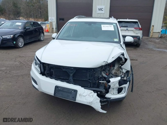 2017 Volkswagen Tiguan Wolfsburg Edition with VIN WVGSV7AX5HK014969, listed as a IAAI auction lot 41742345 with 63,225 mi miles. Bid and sale history available at carsss.com. Image 13.