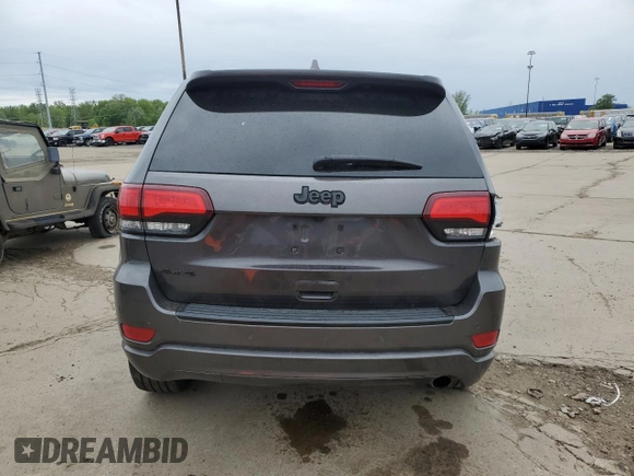 2018 Jeep Grand Cherokee Laredo with VIN 1C4RJFAG2JC179354, listed as a Copart auction lot 57806255 with 128,968 mi miles and Clean title. Bid and sale history available at DreamBid. Image 6.