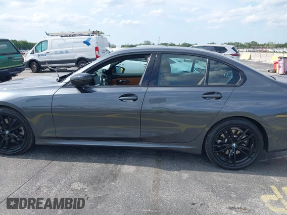 2022 BMW 3 Series 330i with VIN 3MW5R1J0XN8C41168, listed as a IAAI auction lot 42322526 with 44,889 mi miles and . Bid and sale history available at DreamBid. Image 14.
