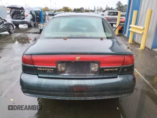 1998 Mercury Mystique z VIN 1MEFM66L5WK667211, wystawiony jako Copart lot #82342784 z przebiegiem 94 102 mil mil oraz Tytuł czysty. Historia ofert i sprzedaży dostępna na DreamBid. Obrazek 6.