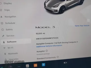 2022 Tesla Model 3 with VIN 5YJ3E1EA9NF375335, listed as a IAAI auction lot 41676024 with 18,836 mi miles. Bid and sale history available at carsss.com. Image 7.