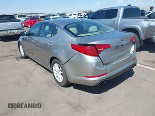 2013 Kia Optima LX with VIN KNAGM4A74D5423255, listed as a IAAI auction lot 42065230 with 116,589 mi miles. Bid and sale history available at carsss.com. Image 3.