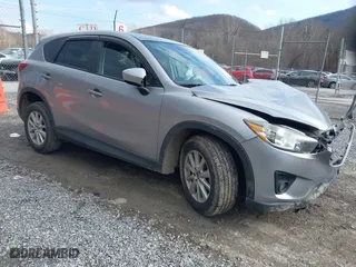 2013 Mazda CX-5 Touring with VIN JM3KE2CE9D0133348, listed as a IAAI auction lot 41357592 with 122,227 mi miles. Bid and sale history available at carsss.com. Image 1.