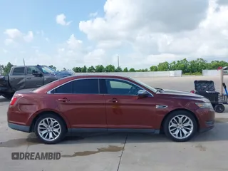 2015 Ford Taurus Limited with VIN 1FAHP2F85FG165586, listed as a IAAI auction lot 42565514 with 183,365 mi miles and . Bid and sale history available at DreamBid. Image 13.