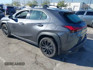 2022 Lexus UX with VIN JTHX3JBH6N2056436, listed as a IAAI auction lot 41856541 with 12,815 mi miles. Bid and sale history available at carsss.com. Image 3.