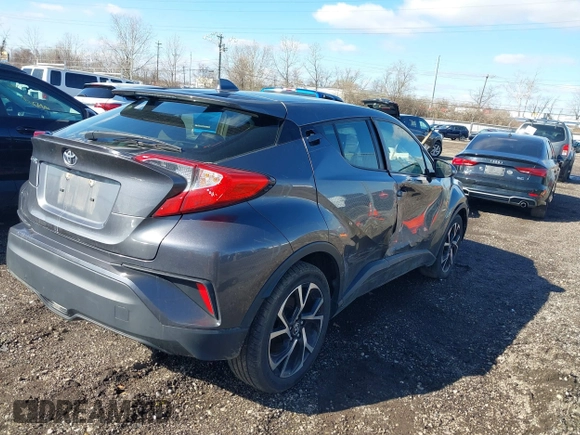 2019 Toyota C-HR XLE with VIN JTNKHMBX4K1048614, listed as a IAAI auction lot 41800696 with 78,191 mi miles. Bid and sale history available at carsss.com. Image 4.