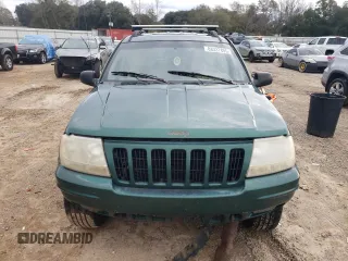 1999 Jeep Grand Cherokee Limited with VIN 1J4GW68S1XC744666, listed as a Copart auction lot 88337895 with 243,480 mi miles and Salvage Title. Bid and sale history available at carsss.com. Image 5.