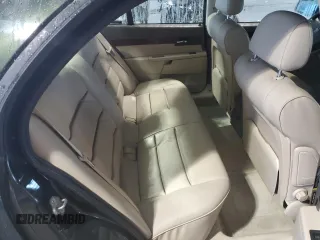 2000 Cadillac Catera z VIN W06VR54R7YR124650, wystawiony jako Copart lot #49602314 z przebiegiem 77 800 mil mil oraz Nie do naprawy. Historia ofert i sprzedaży dostępna na DreamBid. Obrazek 10.