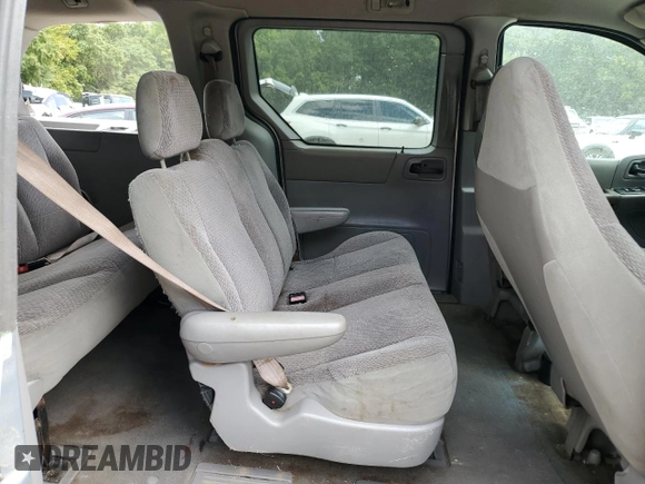 2002 Ford Windstar LX w/910A z VIN 2FMZA50412BB52175, wystawiony jako Copart lot #71832164 z przebiegiem Nie podano mil oraz Szkoda całkowita • Salvage title. Historia ofert i sprzedaży dostępna na DreamBid. Obrazek 11.