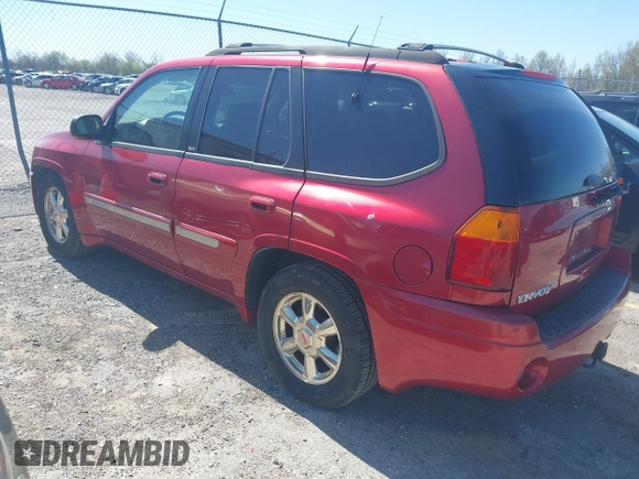 2002 GMC Envoy SLT with VIN 1GKDS13S922205147, listed as a IAAI auction lot 42041118 with 127,400 mi miles. Bid and sale history available at carsss.com. Image 3.