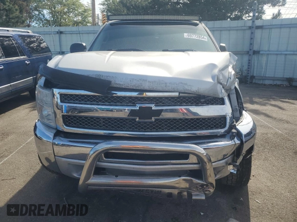2012 Chevrolet Silverado 1500 LT with VIN 1GCNKSE03CZ142394, listed as a Copart auction lot 69772854 with 178,474 mi miles and Salvage Title. Bid and sale history available at DreamBid. Image 5.