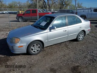 2005 Hyundai Accent GLS z VIN KMHCG45C25U623618, wystawiony jako IAAI lot #42140996 z przebiegiem 184 852 mil mil oraz . Historia ofert i sprzedaży dostępna na DreamBid. Obrazek 2.