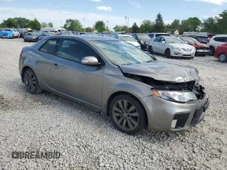 2012 Kia Forte SX с VIN KNAFW6A34C5481086, выставлен на аукционе Copart как лот 57241265 с пробегом 117 233 миль миль и Списание • Salvage title. История ставок и продаж доступна на DreamBid. Изображение 4.