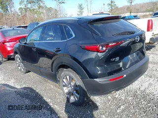 2023 Mazda CX-30 S Premium with VIN 3MVDMBDM7PM528297, listed as a IAAI auction lot 41637542 with 48,935 mi miles and . Bid and sale history available at DreamBid. Image 3.