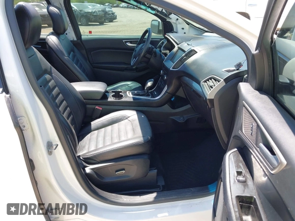 2015 Ford Edge SEL with VIN 2FMTK3J97FBC16209, listed as a IAAI auction lot 41974393 with 129,608 mi miles. Bid and sale history available at carsss.com. Image 5.