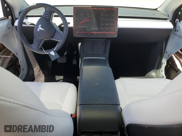 2024 Tesla Model Y Long Range with VIN 7SAYGDEE4RF054753, listed as a Copart auction lot 57989375 with 21,394 mi miles and Salvage title. Bid and sale history available at DreamBid. Image 8.