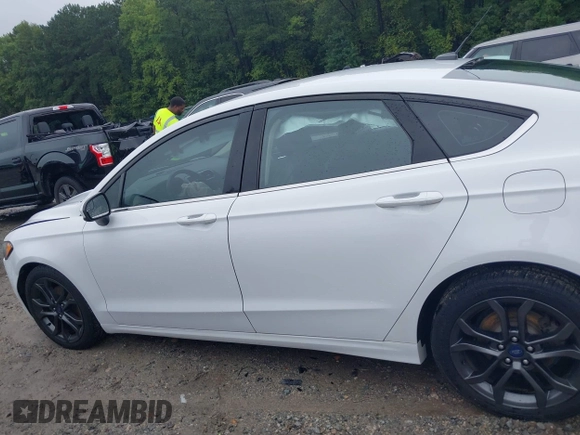 2018 Ford Fusion SE with VIN 3FA6P0HD6JR153230, listed as a IAAI auction lot 40336904 with 71,949 mi miles and . Bid and sale history available at DreamBid. Image 14.
