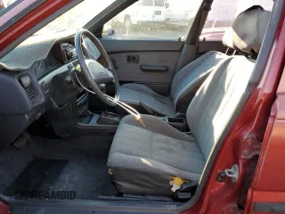 1989 Toyota Corolla with VIN JT2AE92E4K0112945, listed as a Copart auction lot 83382604 with 209,462 mi miles and Salvage title. Bid and sale history available at DreamBid. Image 7.