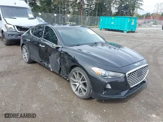 2020 Genesis G70 2.0T with VIN KMTG44LAXLU062079, listed as a IAAI auction lot 41913591 with 24,556 mi miles. Bid and sale history available at carsss.com. Image 1.