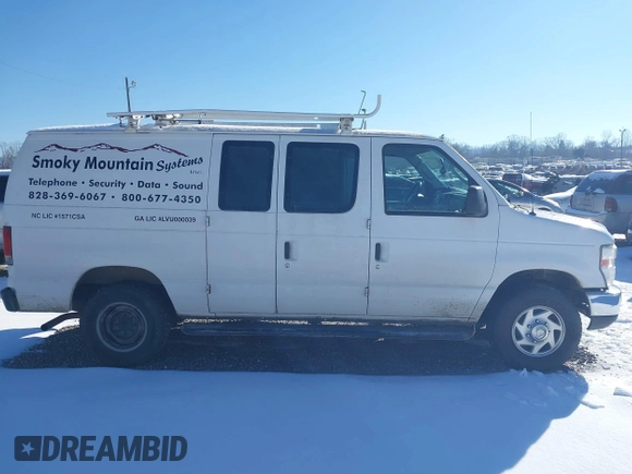 2013 Ford Econoline Cargo Commercial z VIN 1FTNE2EW5DDA25524, wystawiony jako IAAI lot #41208957 z przebiegiem 148 921 mil mil oraz . Historia ofert i sprzedaży dostępna na DreamBid. Obrazek 13.