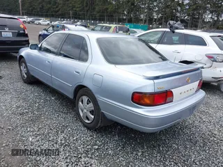 1996 Toyota Camry DX with VIN JT2BG12K2T0396941, listed as a IAAI auction lot 41593032 with 205,514 mi miles. Bid and sale history available at carsss.com. Image 3.