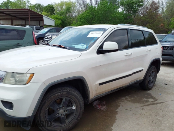 2012 Jeep Grand Cherokee Laredo with VIN 1C4RJFAG8CC124877, listed as a IAAI auction lot 41940603 with 254,356 mi miles. Bid and sale history available at carsss.com. Image 14.