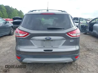 2013 Ford Escape SE with VIN 1FMCU9GX4DUC98328, listed as a IAAI auction lot 41956249 with 114,195 mi miles and . Bid and sale history available at DreamBid. Image 15.