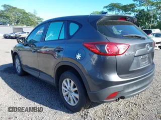 2014 Mazda CX-5 Sport with VIN JM3KE2BE8E0313407, listed as a IAAI auction lot 41215428 with 120,387 mi miles and . Bid and sale history available at carsss.com. Image 3.