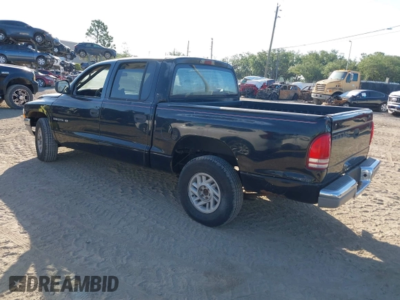 2000 Dodge Dakota Sport with VIN 1B7GL2AN2YS776819, listed as a IAAI auction lot 42066658 with 250,880 mi miles and . Bid and sale history available at carsss.com. Image 3.
