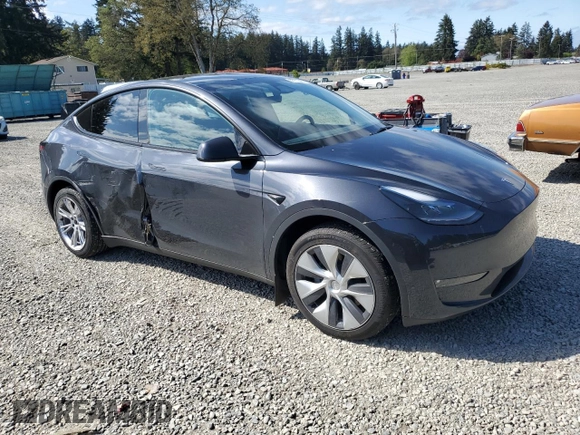 2024 Tesla Model Y Long Range with VIN 7SAYGAEE8RF987571, listed as a Copart auction lot 55110485 with 19,732 mi miles and Salvage title. Bid and sale history available at DreamBid. Image 4.