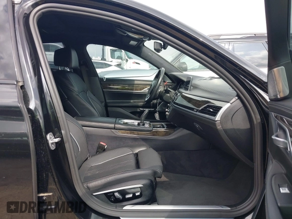 2017 BMW 7 Series 750i with VIN WBA7F0C55HGM21460, listed as a IAAI auction lot 41934198 with 58,206 mi miles and . Bid and sale history available at DreamBid. Image 5.