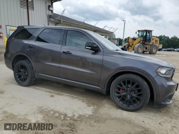 2015 Dodge Durango Limited with VIN 1C4RDJDG0FC904897, listed as a Copart auction lot 58985025 with 147,139 mi miles and Salvage title. Bid and sale history available at DreamBid. Image 4.