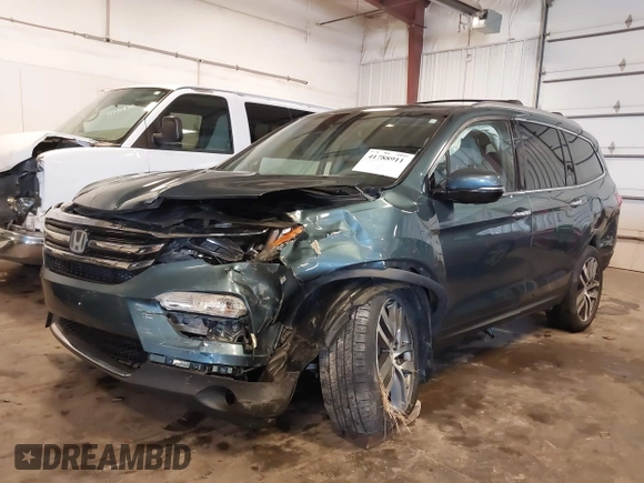 2016 Honda Pilot Elite with VIN 5FNYF6H09GB085621, listed as a IAAI auction lot 41788911 with 137,199 mi miles. Bid and sale history available at carsss.com. Image 2.