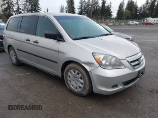 2005 Honda Odyssey LX with VIN 5FNRL382X5B029858, listed as a IAAI auction lot 41885727 with 228,607 mi miles. Bid and sale history available at carsss.com. Image 1.